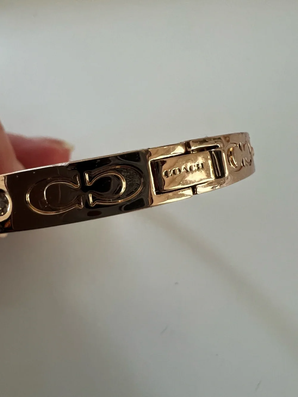 Coach Signature Hinged Bangle Bracelet in Rose Gold CX686